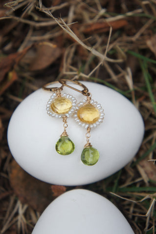 Pearl Citrine and Peridot Earrings on an Egg